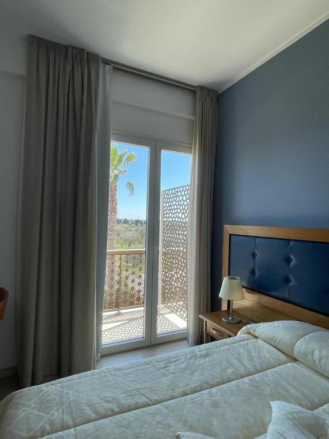 Hotel Posidonia Порто-Чезарео Экстерьер фото