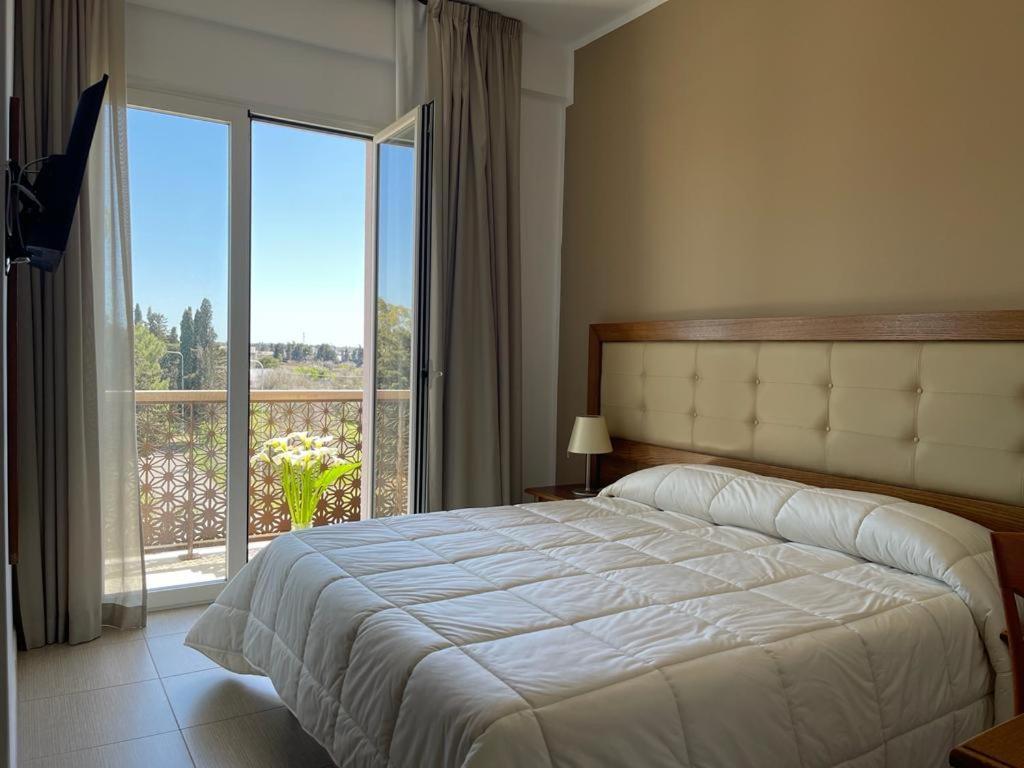 Hotel Posidonia Порто-Чезарео Экстерьер фото